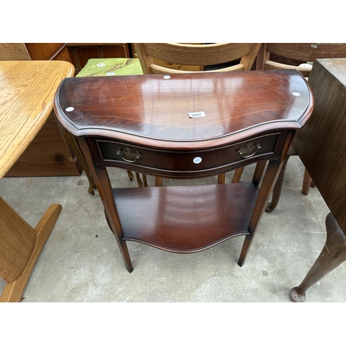 2647 - A MAHOGANY AND CROSSBANDED SERPENTINE FRONT TWO TIER SIDE-TABLE WITH SINGLE DRAWER, 28