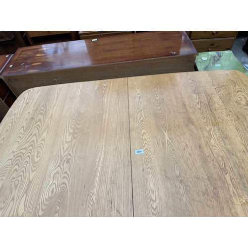 2648 - AN ELM ERCOL STYLE EXTENDING DINING TABLE, 60