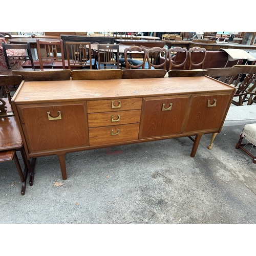 2656 - A RETRO TEAK NATHAN SIDEBOARD ENCLOSING THREE DRAWERS AND THREE CUPBOARDS WITH BRASS HANDLES, 72