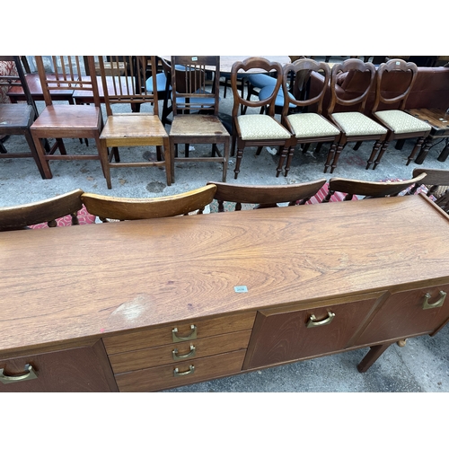 2656 - A RETRO TEAK NATHAN SIDEBOARD ENCLOSING THREE DRAWERS AND THREE CUPBOARDS WITH BRASS HANDLES, 72