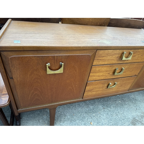 2656 - A RETRO TEAK NATHAN SIDEBOARD ENCLOSING THREE DRAWERS AND THREE CUPBOARDS WITH BRASS HANDLES, 72