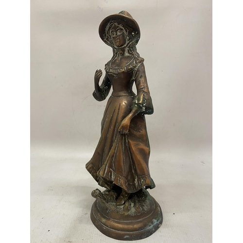 12 - A HEAVY BRONZE FIGURE OF A GIRL WEARING A BONNET - 36 CM(H)