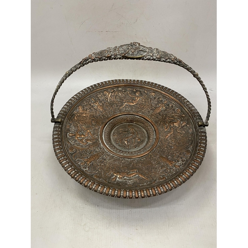 13 - A RENAISSANCE STYLE ELECTROPLATE COPPER FOOTED BOWL WITH HANDLE IN THE MANNER OF FRANCOIS BIROT