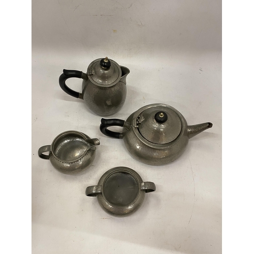 16 - AN ARCHIBALD KNOX FOR LIBERTY TUDRIC PEWTER FOUR PIECE TEASET