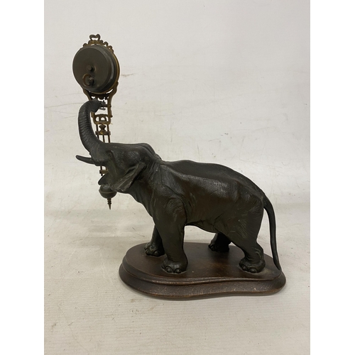 2 - AN ANTIQUE ELEPHANT MYSTERY CLOCK BELIEVED TO BE JUNGHANS GERMANY WITH A DECORATIVE GRIDIRON PENDULU... 