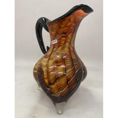 20 - AN ITALIAN MIRHO HAND BLOWN MULTICOLOURED  FOOTED ART GLASS PITCHER