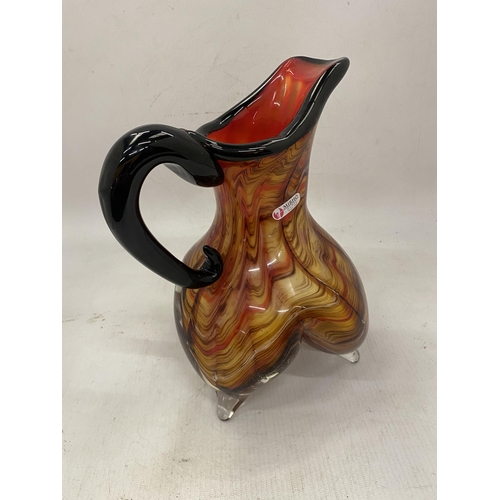 20 - AN ITALIAN MIRHO HAND BLOWN MULTICOLOURED  FOOTED ART GLASS PITCHER