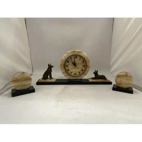 22 - A 1930'S ART DECO CLOCK AND GARNITURES