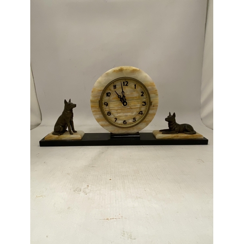 22 - A 1930'S ART DECO CLOCK AND GARNITURES