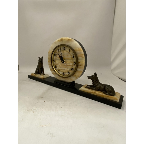 22 - A 1930'S ART DECO CLOCK AND GARNITURES