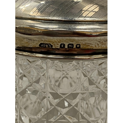 5 - THREE HALLMARKED SILVER AND GLASS ITEMS TO INCLUDE A GLASS PERFUME BOTTLE WITH A SILVER COLLAR, CUT ... 