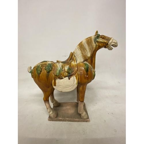 42 - A PAIR OF TANG DYNASTY DRIP GLAZE WAR HORSES - 39.5 X 38.5 CM