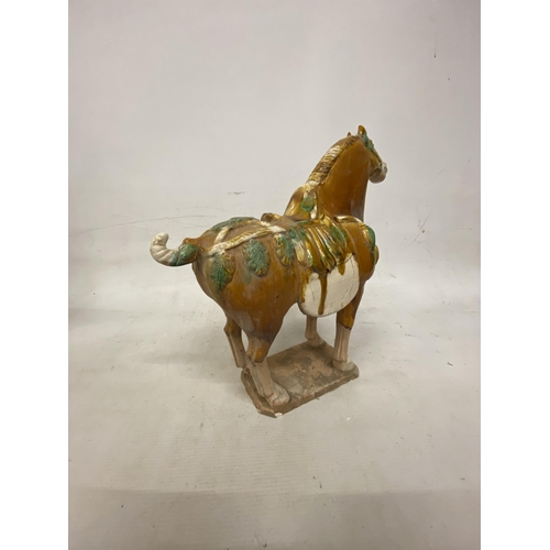 42 - A PAIR OF TANG DYNASTY DRIP GLAZE WAR HORSES - 39.5 X 38.5 CM