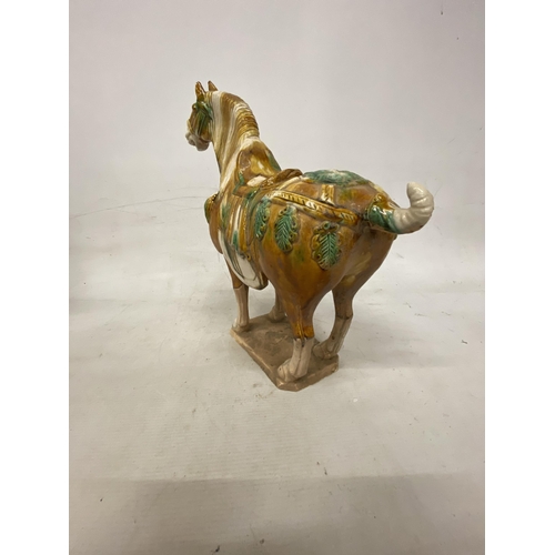 42 - A PAIR OF TANG DYNASTY DRIP GLAZE WAR HORSES - 39.5 X 38.5 CM