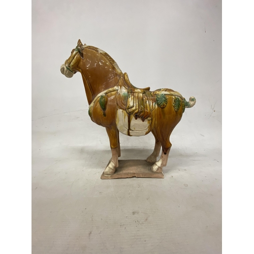 42 - A PAIR OF TANG DYNASTY DRIP GLAZE WAR HORSES - 39.5 X 38.5 CM