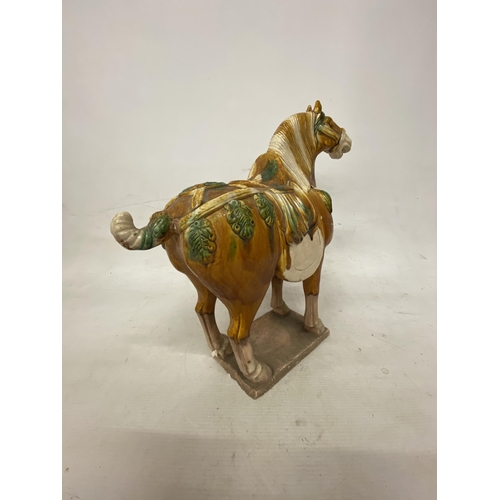 42 - A PAIR OF TANG DYNASTY DRIP GLAZE WAR HORSES - 39.5 X 38.5 CM