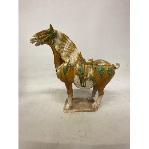 42 - A PAIR OF TANG DYNASTY DRIP GLAZE WAR HORSES - 39.5 X 38.5 CM