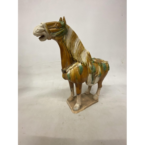 42 - A PAIR OF TANG DYNASTY DRIP GLAZE WAR HORSES - 39.5 X 38.5 CM