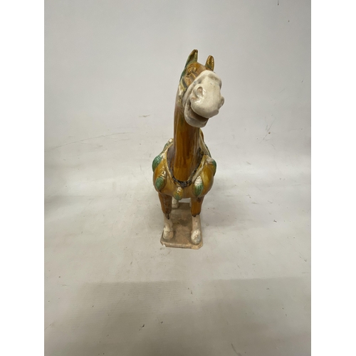 42 - A PAIR OF TANG DYNASTY DRIP GLAZE WAR HORSES - 39.5 X 38.5 CM