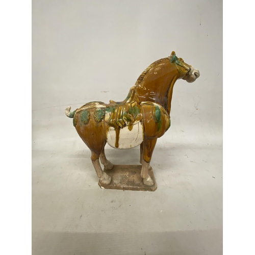 42 - A PAIR OF TANG DYNASTY DRIP GLAZE WAR HORSES - 39.5 X 38.5 CM