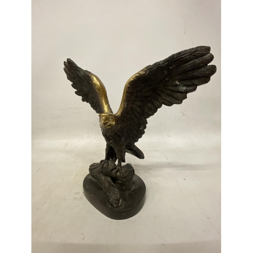 59 - A VINTAGE BRASS EAGLE STATUE BIRD OF PREY ON A BRANCH - 36 CM