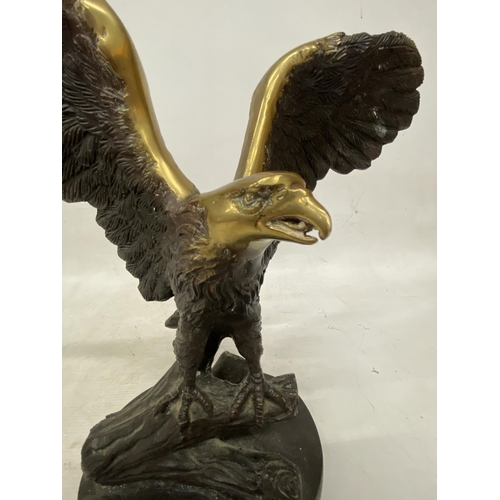 59 - A VINTAGE BRASS EAGLE STATUE BIRD OF PREY ON A BRANCH - 36 CM