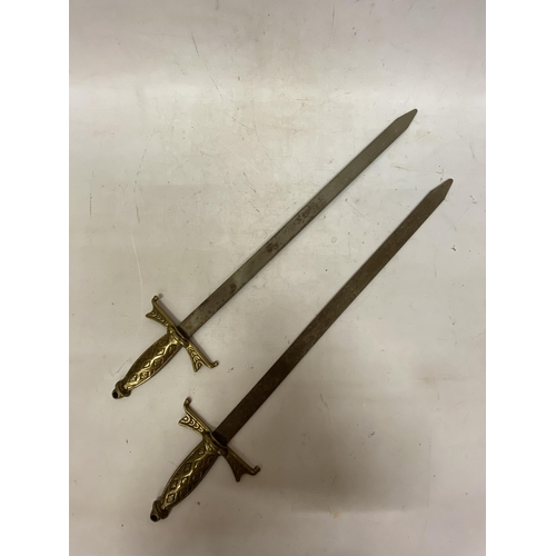 62 - TWO VINTAGE BRASS HANDLED SWORDS