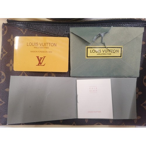 17 - A BELIEVED TO BE LOUIS VUITTON PARIS LEATHER MONOGRAM PATTERN CLUTCH BAG IN DUST COVER - NO WARRANTI... 