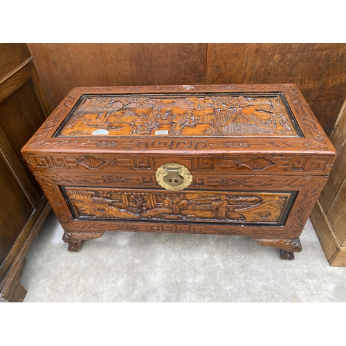 2512 - AN ORIENTAL CARVED HARDWOOD BLANKET CHEST, 34