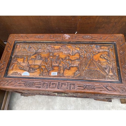 2512 - AN ORIENTAL CARVED HARDWOOD BLANKET CHEST, 34