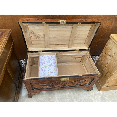 2512 - AN ORIENTAL CARVED HARDWOOD BLANKET CHEST, 34