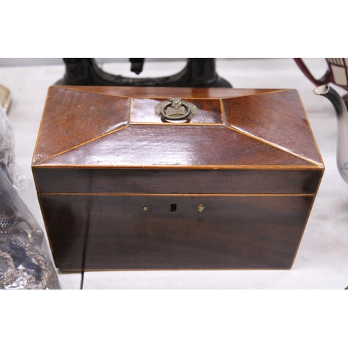 106 - TWO VINTAGE TEA CADDYS TO INCLUDE A MAHOGANY SARCOPHAGUS SHAPED ONE WITH INLAY