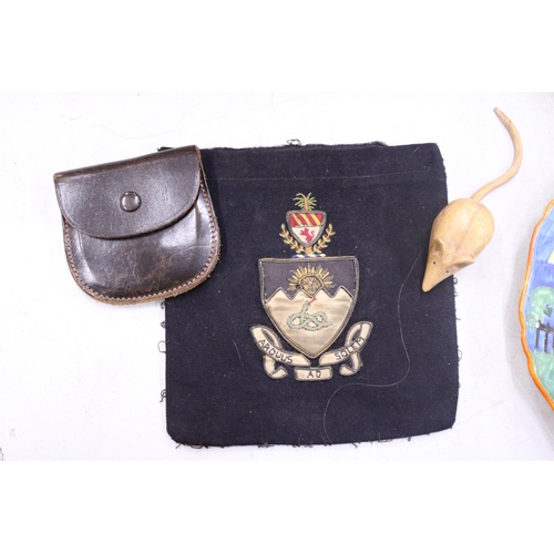 177 - A VINTAGE MANCHESTER UNIVERSITY BADGE, CARVED MOUSE AND LEATHER POUCH