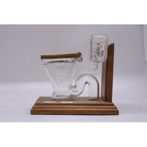 180 - A HANDMADE MINIATURE GLASS AND WOOD TOILET AND CISTERN