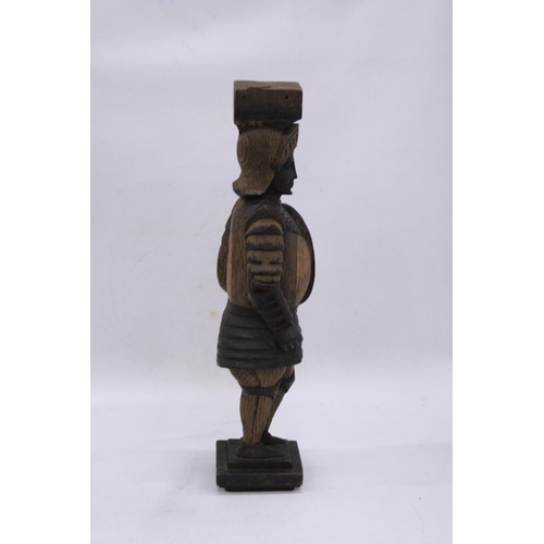 189 - A VINTAGE WOOD CARVED KNIGHT FIGURE