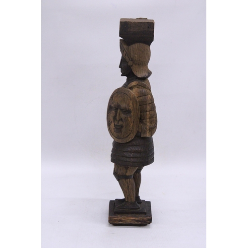 189 - A VINTAGE WOOD CARVED KNIGHT FIGURE