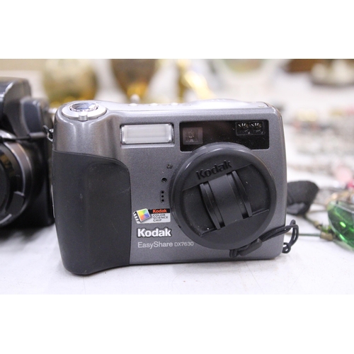 202 - TWO KODAK CAMERAS WITH CHARGER (DX7590 / DX7630)