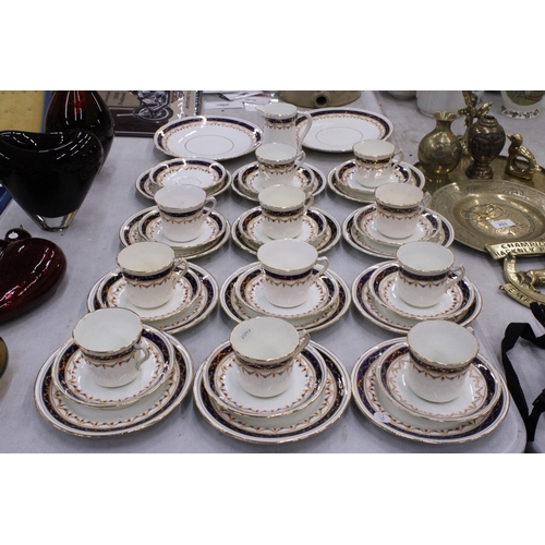 204 - A LARGE QUANTITY OF VINTAGE CUPOS, SAUCERS AND SIDE PLATES PLUS TWO CAKE PLATES AND A CREAM JUG