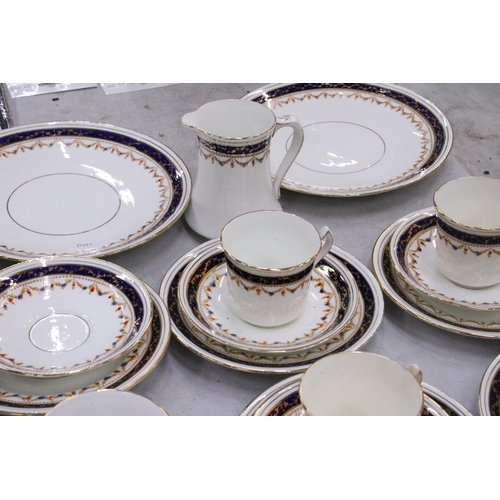 204 - A LARGE QUANTITY OF VINTAGE CUPOS, SAUCERS AND SIDE PLATES PLUS TWO CAKE PLATES AND A CREAM JUG