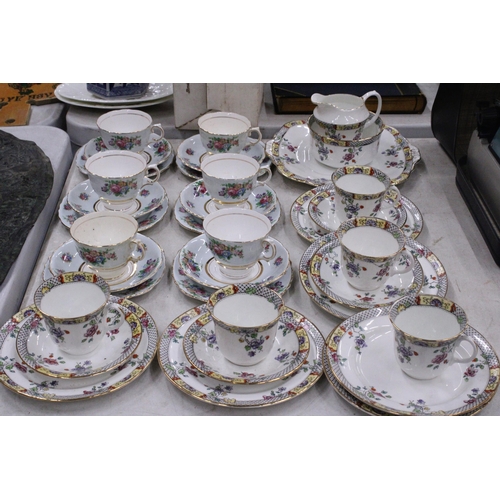 213 - A QUANTITY OF VINTAGE COLCLOUGH AND SUTHERLAND CHINA CUPS, SAUCERS, SIDE PLATES, A CAKE PLATE, CREAM... 