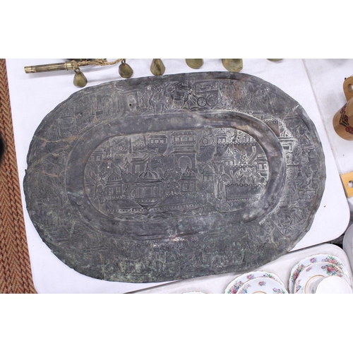 214 - A LARGE VINTAGE COPPER TRAY WITH EMBOSSED INDIAN SCENES, 70CM X 47CM