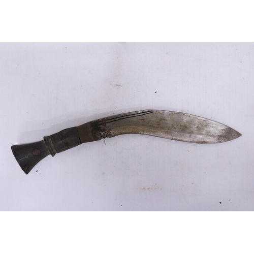 218 - A VINTAGE GURKHA KUKRI KNIFE AND A BOOMERANG