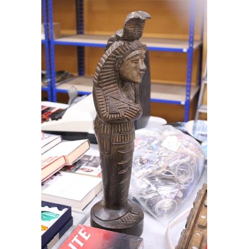 228 - A LARGE EGYPTIAN CARVED WOODEN STATUE, HEIGHT 57CM