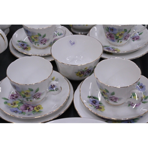 245 - A BONE CHINA TEASET WITH PANSY PATTERN TO INCLUDE A CAKE PLATE, CREAM JUG, SUGAR BOWL CUPS, SAUCERS ... 