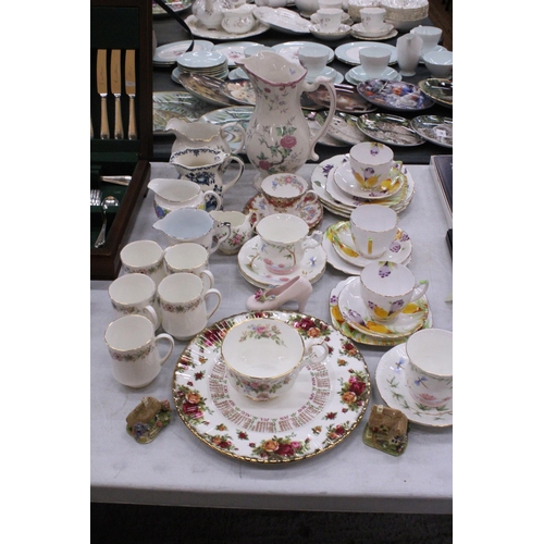 250 - A LARGE QUANTITY OF TEAWARE ETC TO INCLUDE OAKLEIGH CERAMICS 'SHELLEY'S TEAWARE 2002' TRIO AND CUP A... 