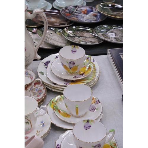 250 - A LARGE QUANTITY OF TEAWARE ETC TO INCLUDE OAKLEIGH CERAMICS 'SHELLEY'S TEAWARE 2002' TRIO AND CUP A... 