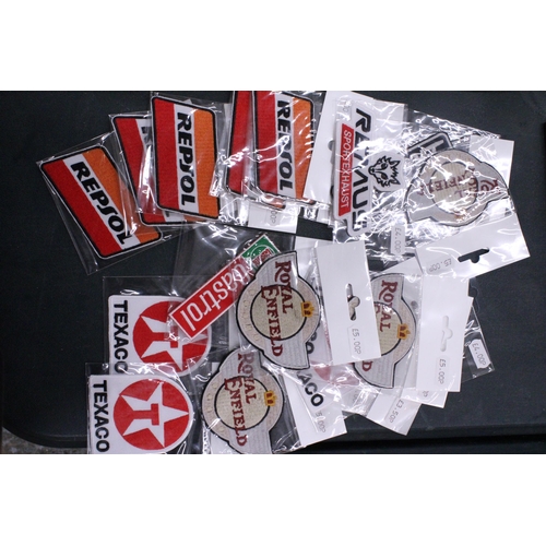 258 - TWENTY SEW ON MOTORING THEMED BADGES TO INCLUDE REPSOL, TEXACO AND ROYAL ENFIELD - ALL AS NEW IN PAC... 