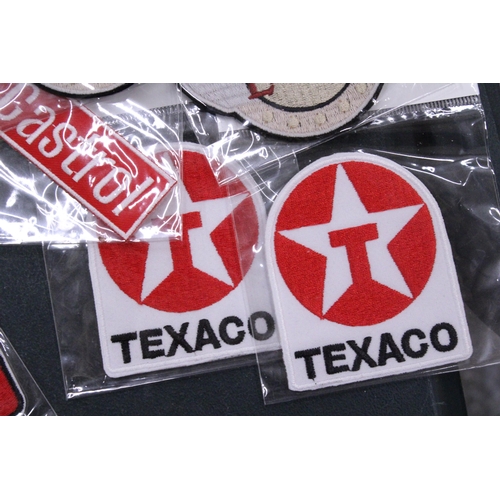 258 - TWENTY SEW ON MOTORING THEMED BADGES TO INCLUDE REPSOL, TEXACO AND ROYAL ENFIELD - ALL AS NEW IN PAC... 