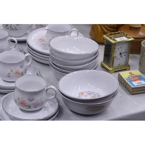 271 - A DENBY PART DINNER SERVICE TO INCLUDE PLATES, BOWLS, A SERVING PLATE, LARGE JUG, CREAM JUG, SUGAR B... 