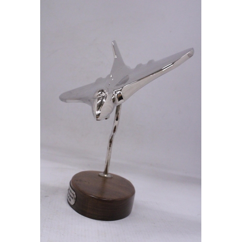 71 - A CHROME VULCAN BOMBER ON A WOODEN BASE